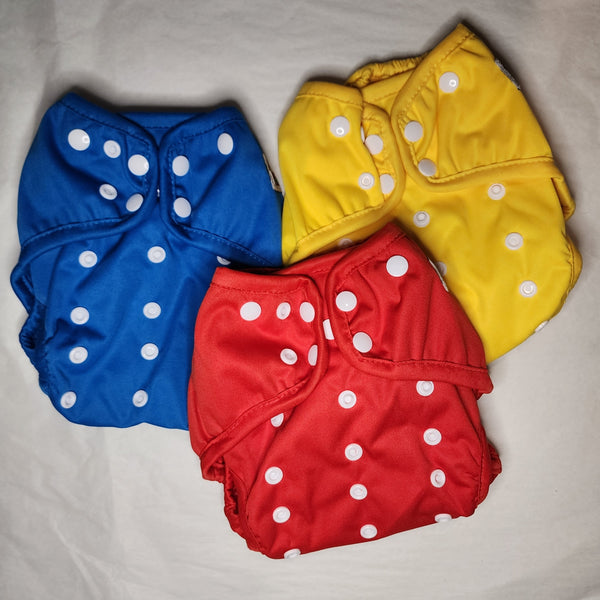 Blue, Yellow, and Red One Size cloth diaper covers