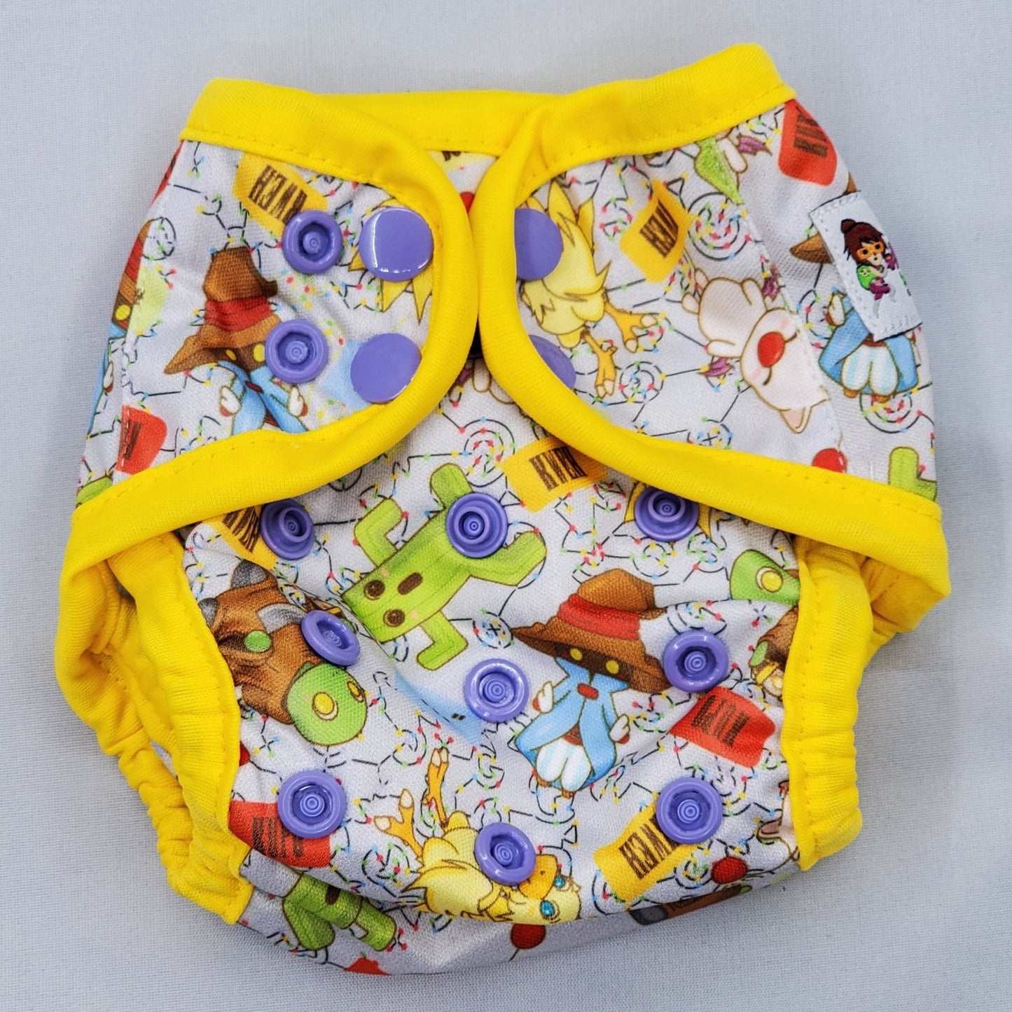 newborn cloth diaper cover featuring artwork inspired by final fantasy