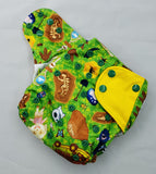 overnight cloth diaper. A modern cloth diaper with a fandom-inspired design. Vibrant and detailed, it showcases fanart inspired by animal crossing and jurassic park