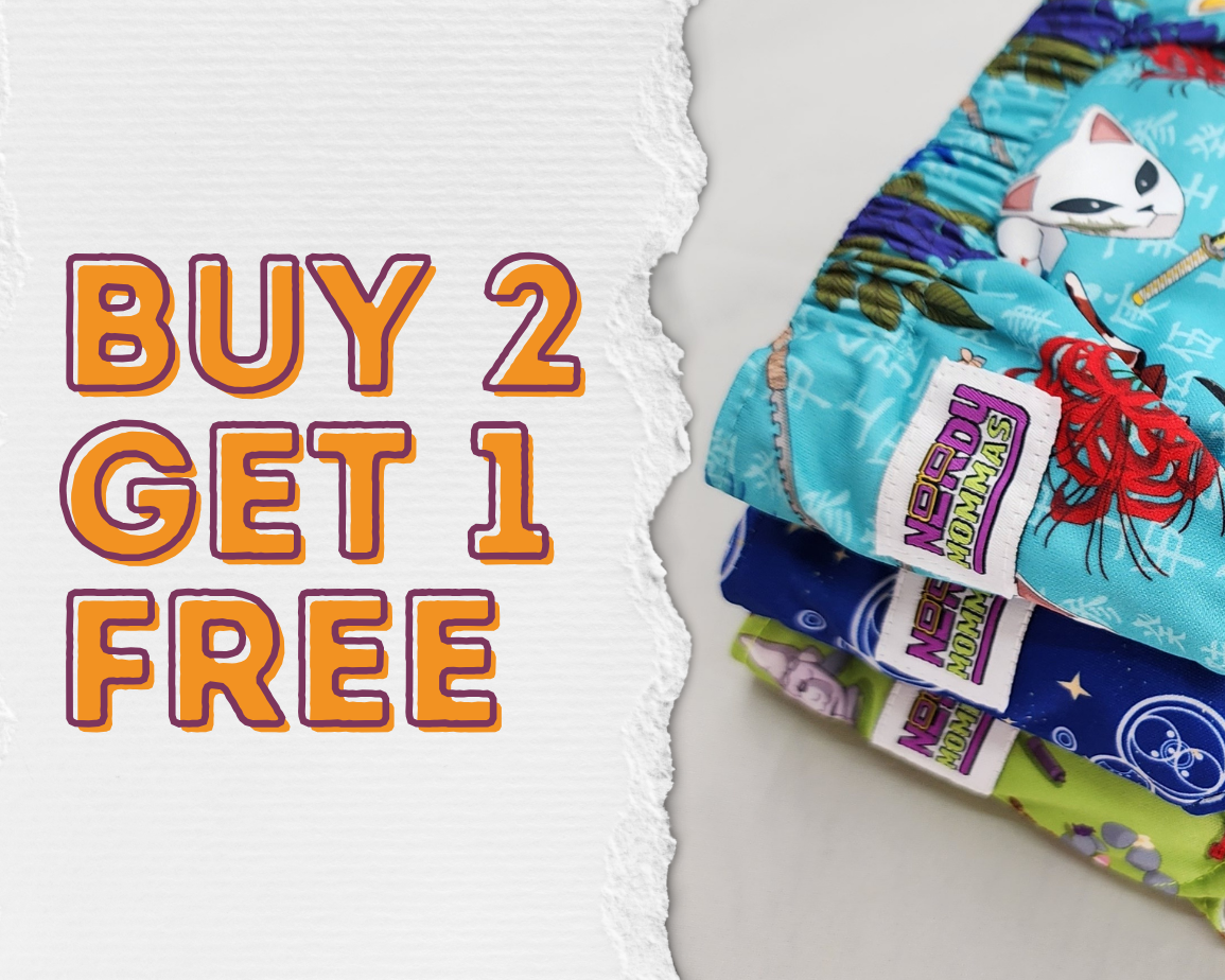 Stack of colorful patterned cloth diapers with promotional text on a white background