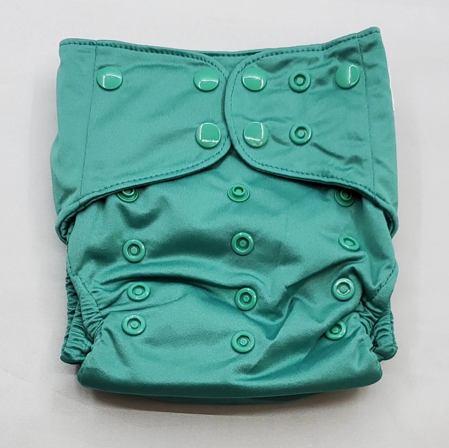 overnight cloth diaper. A modern cloth diaper with a fandom-inspired design. Vibrant and detailed, color inspired by legend of zelda. link green