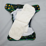 Overnight cloth diaper. inner view of two semi attached bamboo cotton inserts