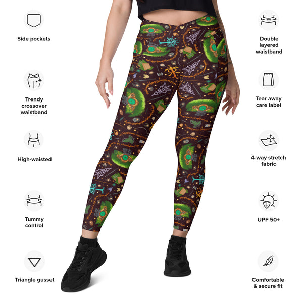Front view of cross over waistband leggings with pockets. featuring fandom desing inspired by the hobbit and the lord of the rings